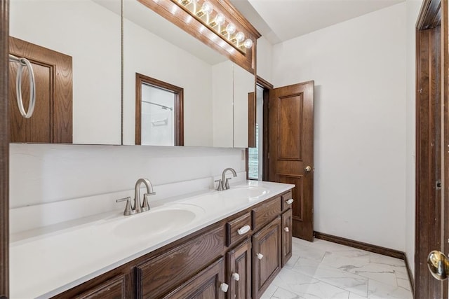 2717 Asheforde Oaks Blvd, Edmond, OK 73034 - full bath featuring marble look tile flooring and double vanity
