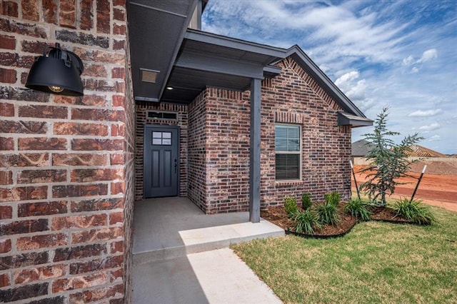 2013 W Crossbow Way, Mustang, OK 73064 - property entrance featuring brick siding