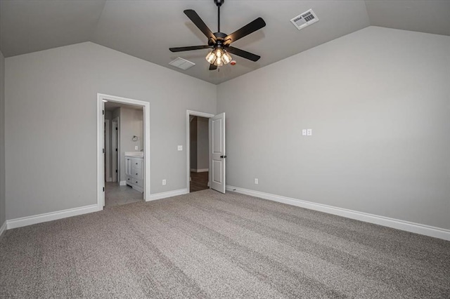 2013 W Crossbow Way, Mustang, OK 73064 - unfurnished bedroom featuring lofted ceiling, light colored carpet, ceiling fan, and connected bathroom