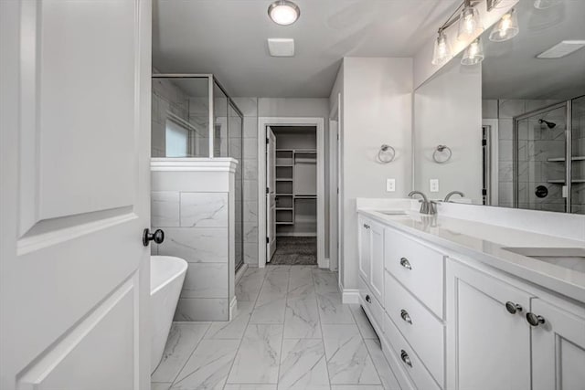 2013 W Crossbow Way, Mustang, OK 73064 - full bathroom with marble look tile flooring, a stall shower, a freestanding bath, and double vanity