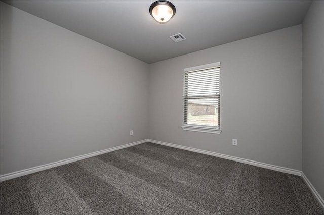 2013 W Crossbow Way, Mustang, OK 73064 - empty room featuring dark carpet and baseboards