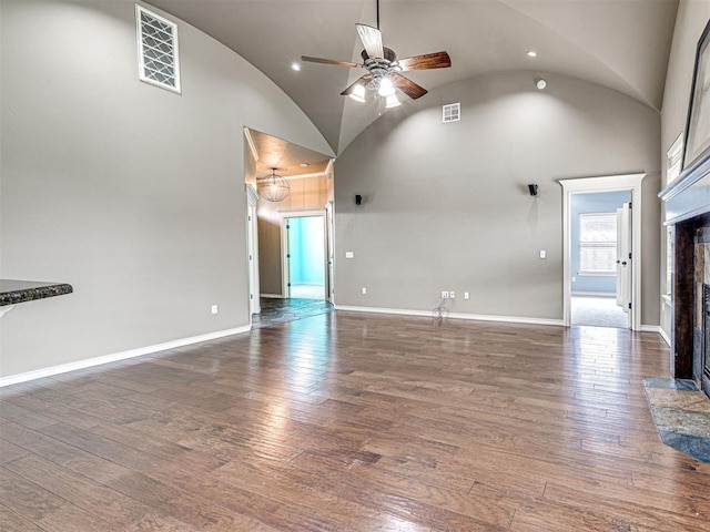 2311 Washita Trl, Edmond, OK 73003 - unfurnished living room featuring a fireplace with flush hearth, ceiling fan, high vaulted ceiling, hardwood / wood-style floors, and recessed lighting