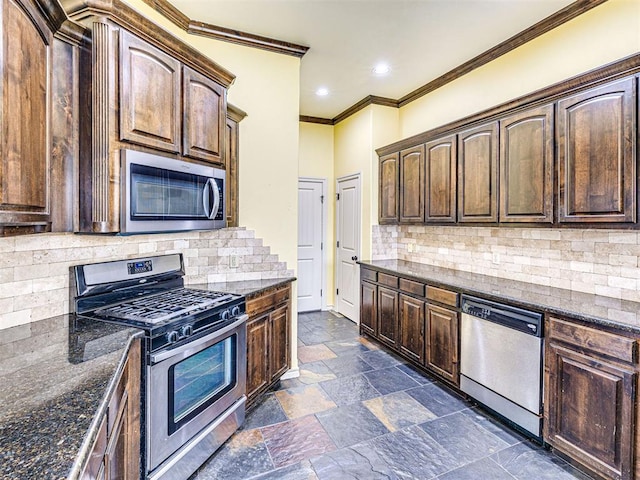 2311 Washita Trl, Edmond, OK 73003 - kitchen featuring appliances with stainless steel finishes, ornamental molding, dark brown cabinetry, tasteful backsplash, and recessed lighting