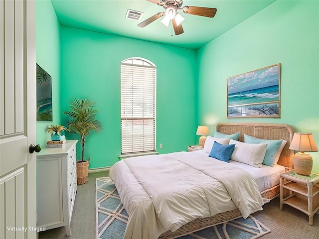 2311 Washita Trl, Edmond, OK 73003 - bedroom featuring light colored carpet and ceiling fan