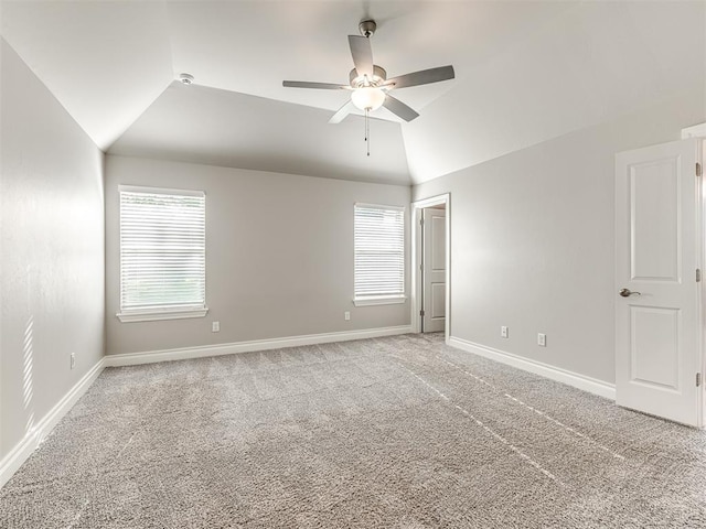 15913 Windrush Pl, Edmond, OK 73013 - unfurnished bedroom with lofted ceiling, light colored carpet, and a ceiling fan
