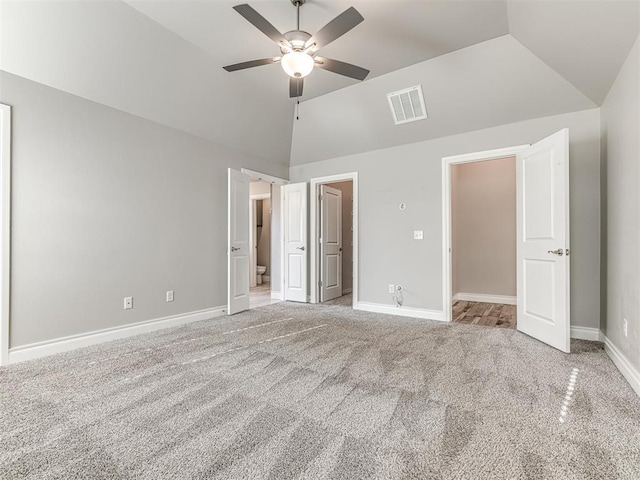 15913 Windrush Pl, Edmond, OK 73013 - unfurnished bedroom featuring carpet flooring, high vaulted ceiling, ensuite bathroom, and a ceiling fan