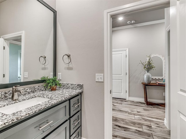 15913 Windrush Pl, Edmond, OK 73013 - bathroom featuring vanity and baseboards