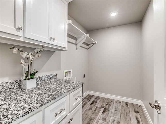 15913 Windrush Pl, Edmond, OK 73013 - laundry area with cabinet space, light wood-type flooring, washer hookup, electric dryer hookup, and recessed lighting
