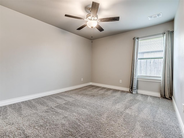 15913 Windrush Pl, Edmond, OK 73013 - spare room featuring ceiling fan and carpet floors