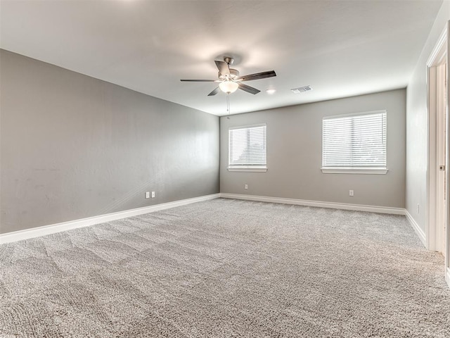 15913 Windrush Pl, Edmond, OK 73013 - carpeted empty room featuring a ceiling fan and baseboards