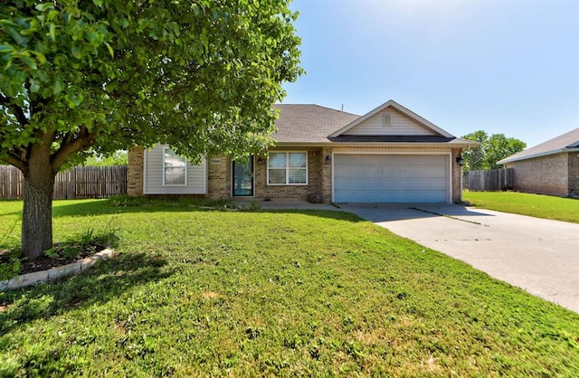 13664 NW Bradbury Ln, Piedmont, OK 73078 - ranch-style home featuring a garage, driveway, and brick siding