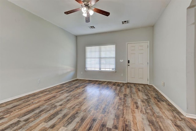 13664 NW Bradbury Ln, Piedmont, OK 73078 - empty room with wood finished floors and a ceiling fan