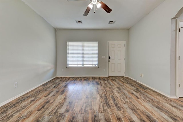 13664 NW Bradbury Ln, Piedmont, OK 73078 - spare room with wood finished floors and ceiling fan