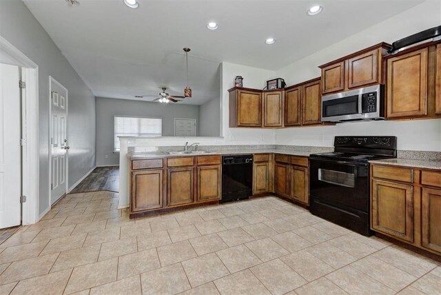 13664 NW Bradbury Ln, Piedmont, OK 73078 - kitchen featuring black appliances, brown cabinetry, a ceiling fan, and recessed lighting