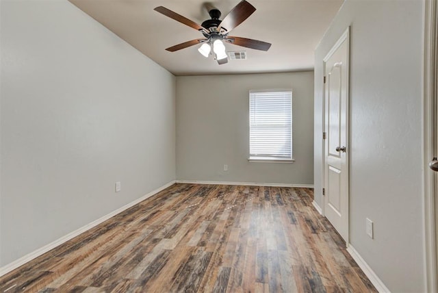 13664 NW Bradbury Ln, Piedmont, OK 73078 - empty room with wood finished floors and a ceiling fan