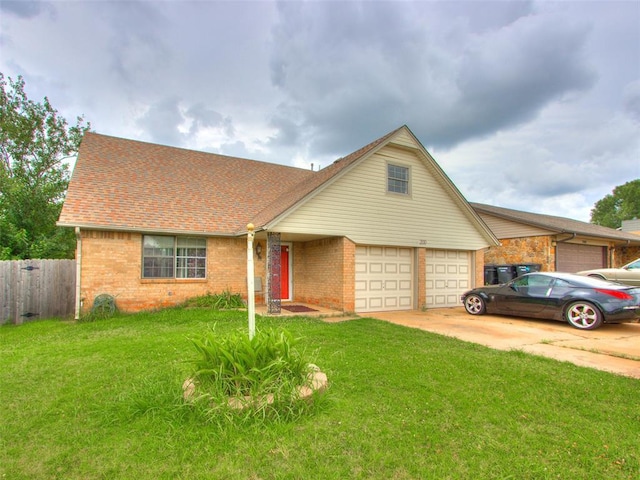 200 S Morgan Dr, Moore, OK 73160 - traditional-style home featuring brick siding, concrete driveway, an attached garage, and roof with shingles