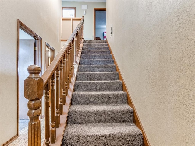 200 S Morgan Dr, Moore, OK 73160 - stairs featuring a textured wall and baseboards