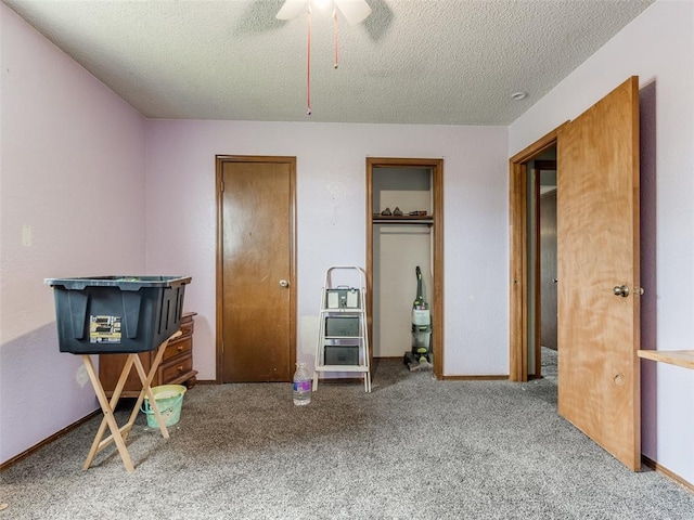 200 S Morgan Dr, Moore, OK 73160 - bedroom with carpet floors, a textured ceiling, and a ceiling fan