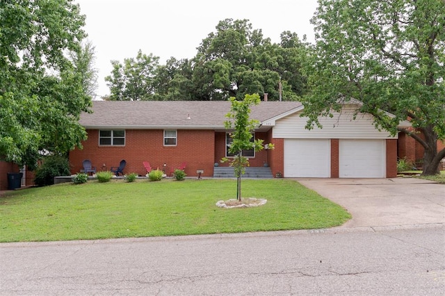 320 E 13th St, Edmond, OK 73034 - ranch-style house with a garage, brick siding, concrete driveway, and a front yard