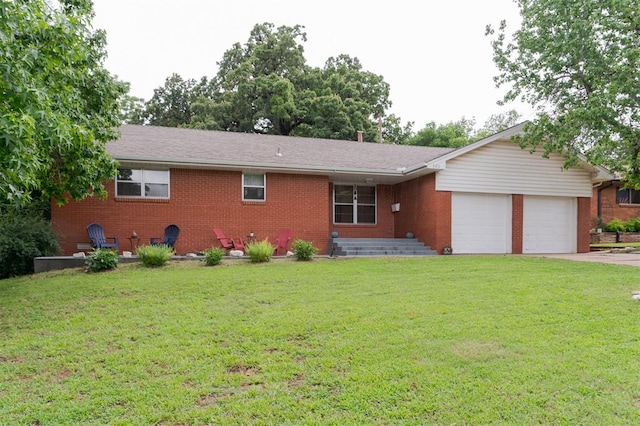320 E 13th St, Edmond, OK 73034 - single story home featuring brick siding, an attached garage, and a front yard