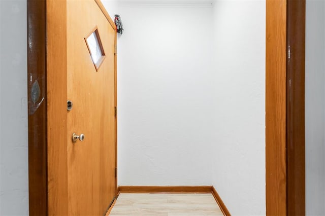 320 E 13th St, Edmond, OK 73034 - hallway with baseboards and light wood-type flooring