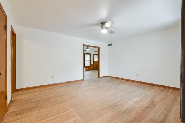 320 E 13th St, Edmond, OK 73034 - unfurnished room featuring a ceiling fan and light wood finished floors