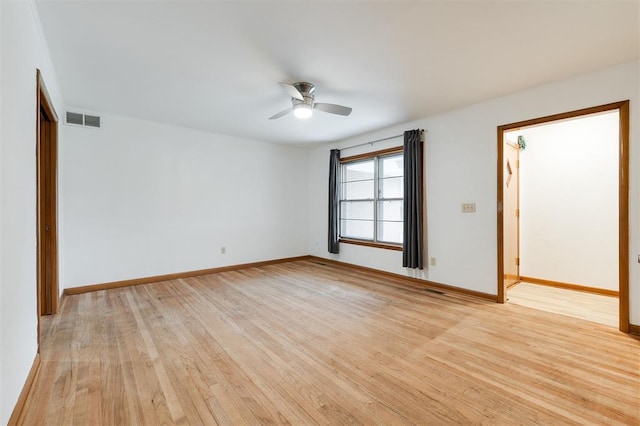 320 E 13th St, Edmond, OK 73034 - spare room featuring a ceiling fan and light wood-type flooring