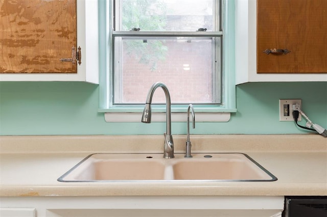 320 E 13th St, Edmond, OK 73034 - kitchen view of a sink and light countertops