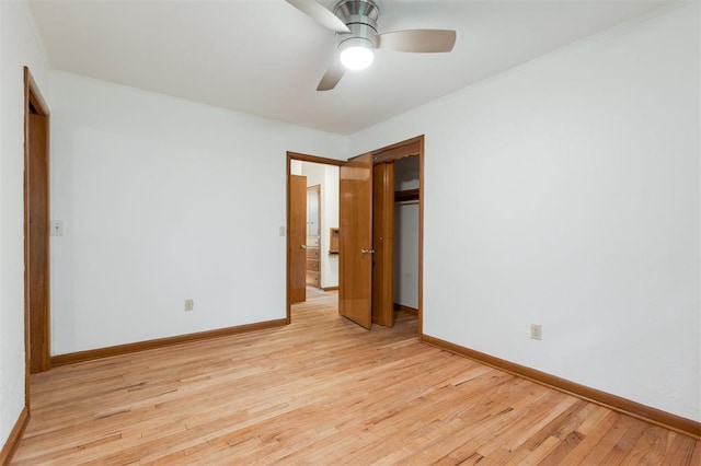 320 E 13th St, Edmond, OK 73034 - unfurnished bedroom featuring light wood finished floors, ornamental molding, ceiling fan, and a closet