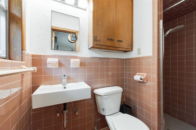 320 E 13th St, Edmond, OK 73034 - full bathroom featuring a shower stall, tile walls, and wainscoting