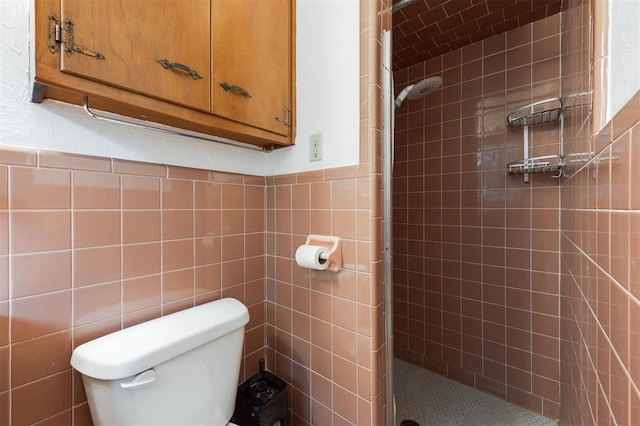 320 E 13th St, Edmond, OK 73034 - full bath featuring a stall shower, tile walls, and wainscoting
