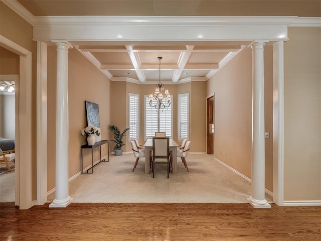 325 NW 146th St, Edmond, OK 73013 - dining space with a chandelier, coffered ceiling, beam ceiling, ornate columns, and light colored carpet
