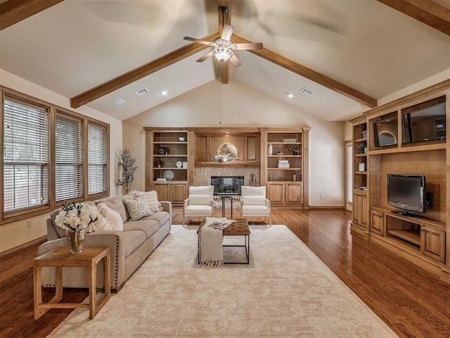 325 NW 146th St, Edmond, OK 73013 - living area with a ceiling fan, wood finished floors, a glass covered fireplace, and recessed lighting