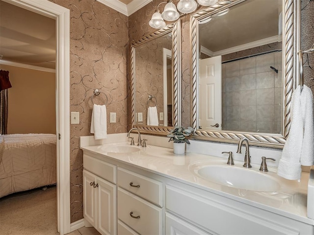 325 NW 146th St, Edmond, OK 73013 - ensuite bathroom featuring ornamental molding and double vanity