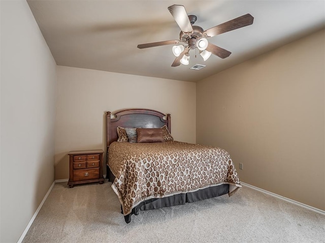 325 NW 146th St, Edmond, OK 73013 - carpeted bedroom featuring baseboards and a ceiling fan
