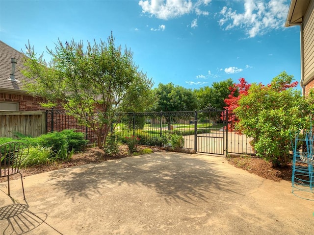 325 NW 146th St, Edmond, OK 73013 - view of patio / terrace with a gate