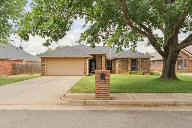 1729 Dena Dr, Edmond, OK 73003 - view of front of property featuring a garage, concrete driveway, brick siding, and roof with shingles