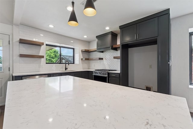 1729 Dena Dr, Edmond, OK 73003 - kitchen featuring open shelves, appliances with stainless steel finishes, backsplash, light stone counters, and recessed lighting