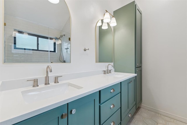 1729 Dena Dr, Edmond, OK 73003 - bathroom featuring double vanity and a tile shower