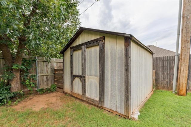 1729 Dena Dr, Edmond, OK 73003 - view of shed with a fenced backyard