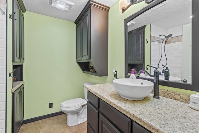 625 N Broadway St, Hydro, OK 73048 - bathroom with a textured ceiling and vanity