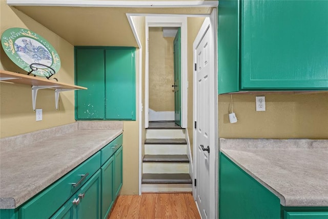 625 N Broadway St, Hydro, OK 73048 - kitchen with light wood-type flooring, green cabinetry, and light countertops