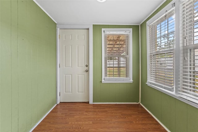 625 N Broadway St, Hydro, OK 73048 - entryway with wood finished floors, crown molding, and plenty of natural light