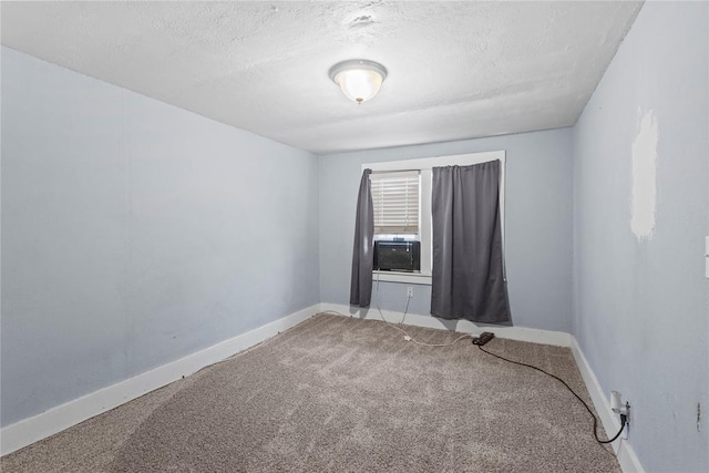 625 N Broadway St, Hydro, OK 73048 - spare room featuring carpet floors and a textured ceiling