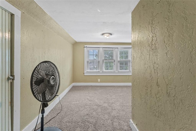 625 N Broadway St, Hydro, OK 73048 - hallway with carpet floors and a textured wall