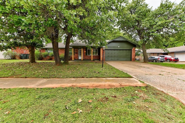 3708 Greenway Ter, Del City, OK 73115 - ranch-style house featuring brick siding, an attached garage, driveway, and a front lawn