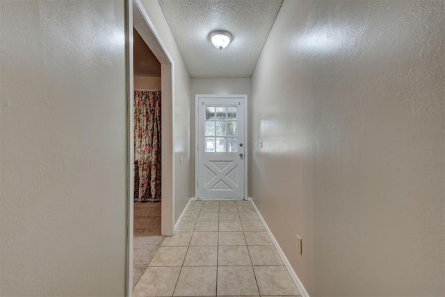 3708 Greenway Ter, Del City, OK 73115 - entryway featuring a textured ceiling and light tile patterned floors