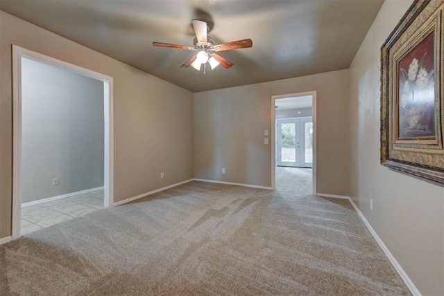 3708 Greenway Ter, Del City, OK 73115 - unfurnished room featuring light carpet, a ceiling fan, and french doors
