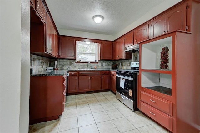 3708 Greenway Ter, Del City, OK 73115 - kitchen featuring stainless steel range oven, a textured ceiling, extractor fan, decorative backsplash, and light tile patterned flooring