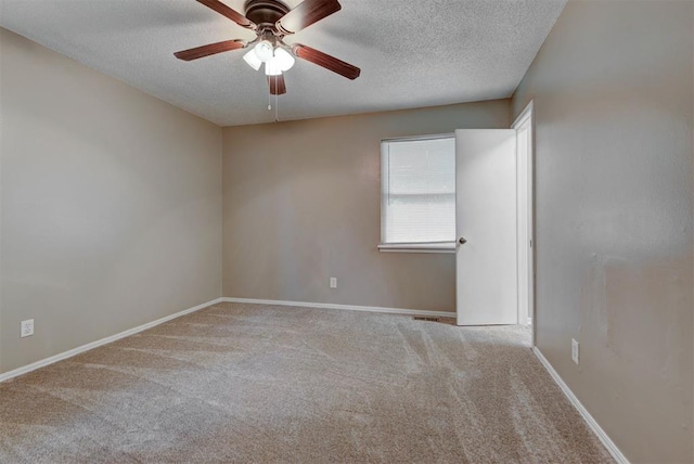 3708 Greenway Ter, Del City, OK 73115 - carpeted spare room with a textured ceiling and ceiling fan
